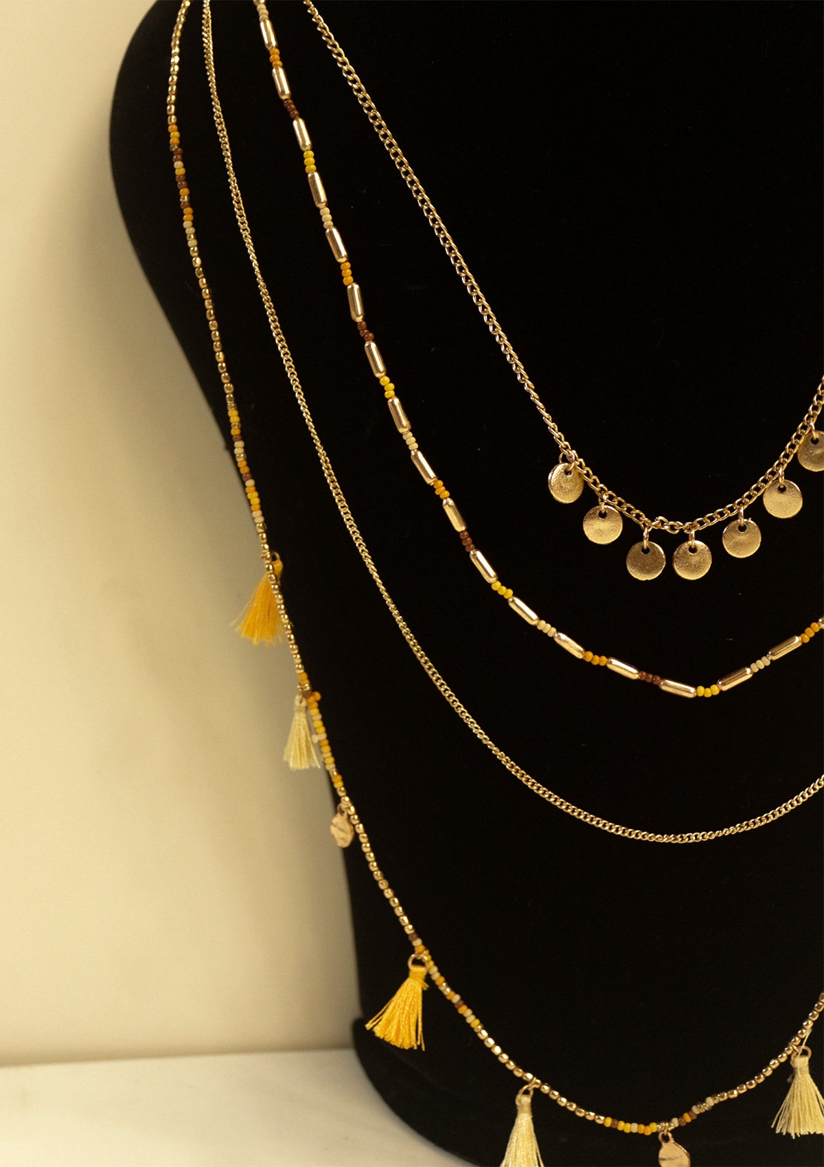 Multilayered tasseled necklace